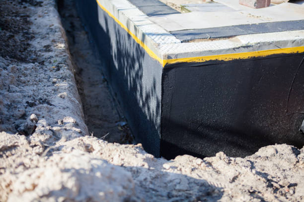Professional Wet Basement Repair technician working in Auburn, NY